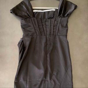 Beautiful elegant black dress. Perfect for all black attire affairs.